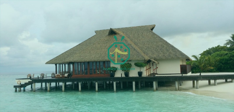 Use of plastic reed thatch tiles of tropical island beach buildings Use of plastic reed thatch tiles of tropical island beach buildings