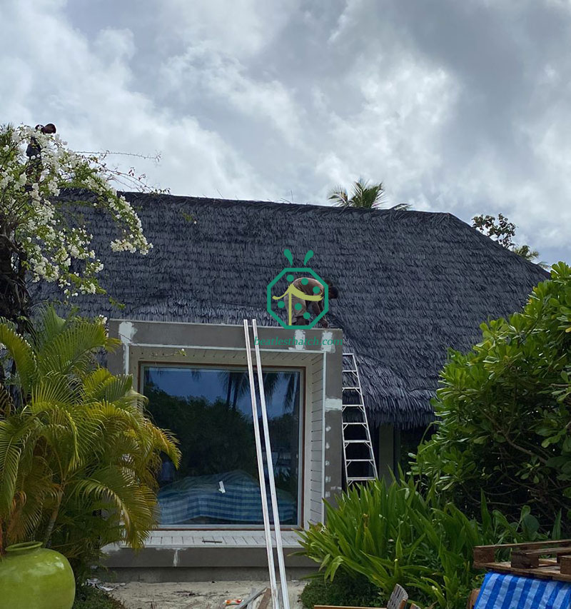 Construction of plastic kajan thatch roof in Maldives Resort Hotel